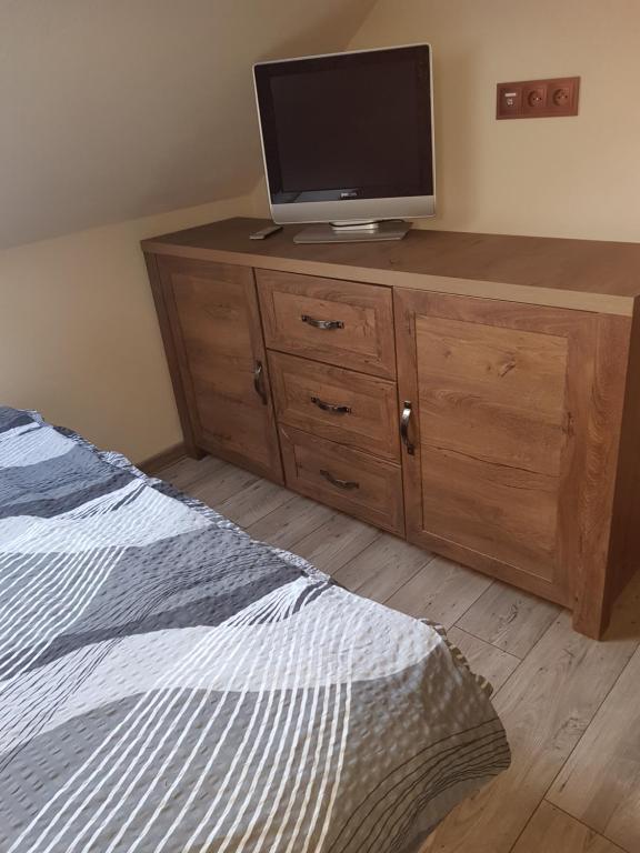 Postel nebo postele na pokoji v ubytování Drevenica MARKA beachfront cottage