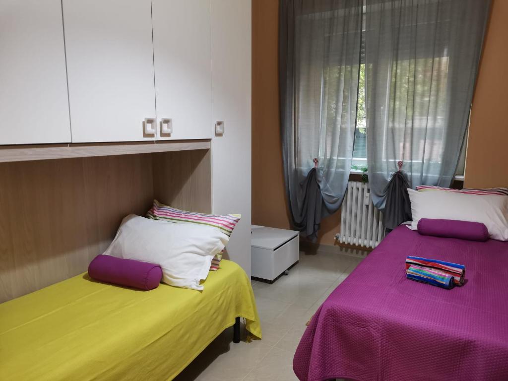 Posteľ alebo postele v izbe v ubytovaní Bnbook-Skyliner Train Station con due camere da letto
