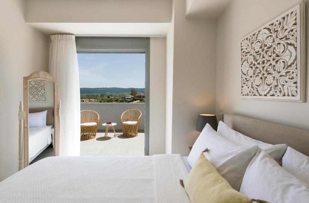 Postel nebo postele na pokoji v ubytování Soleado Luxury Villas