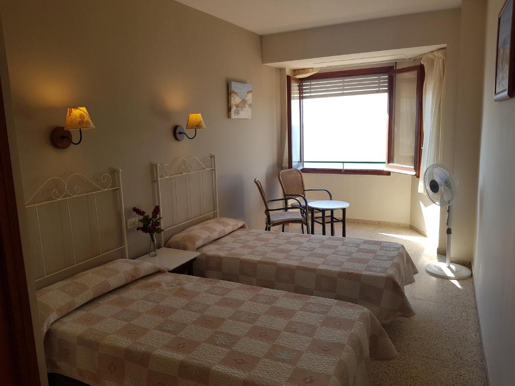 Posteľ alebo postele v izbe v ubytovaní Hotel Maeva ,1 star B&B