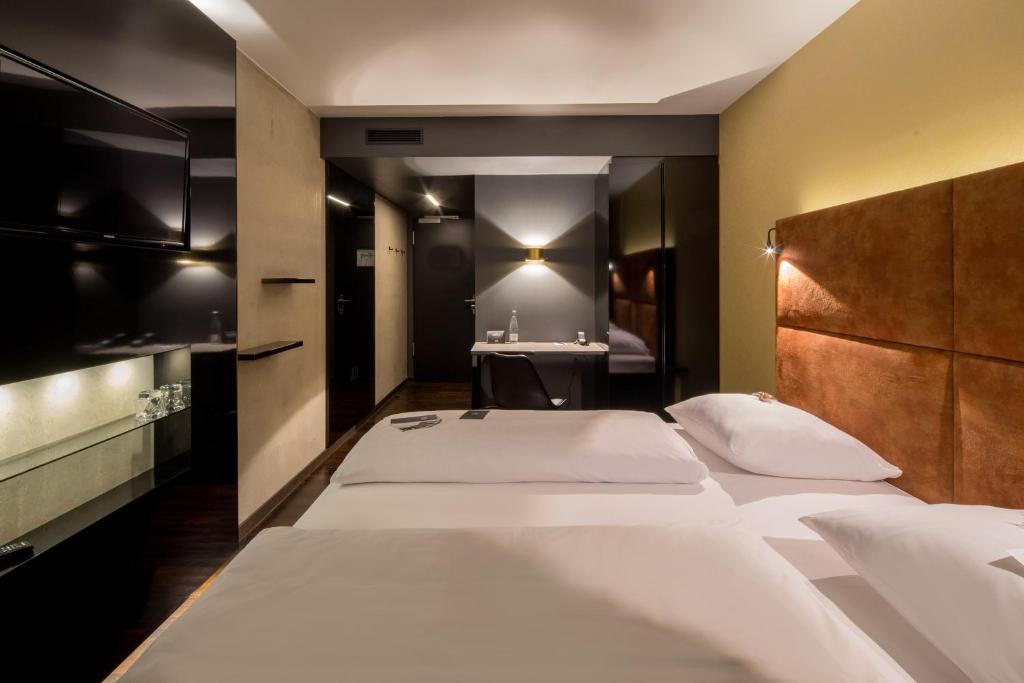 Postel nebo postele na pokoji v ubytování Hotel ZOE by AMANO