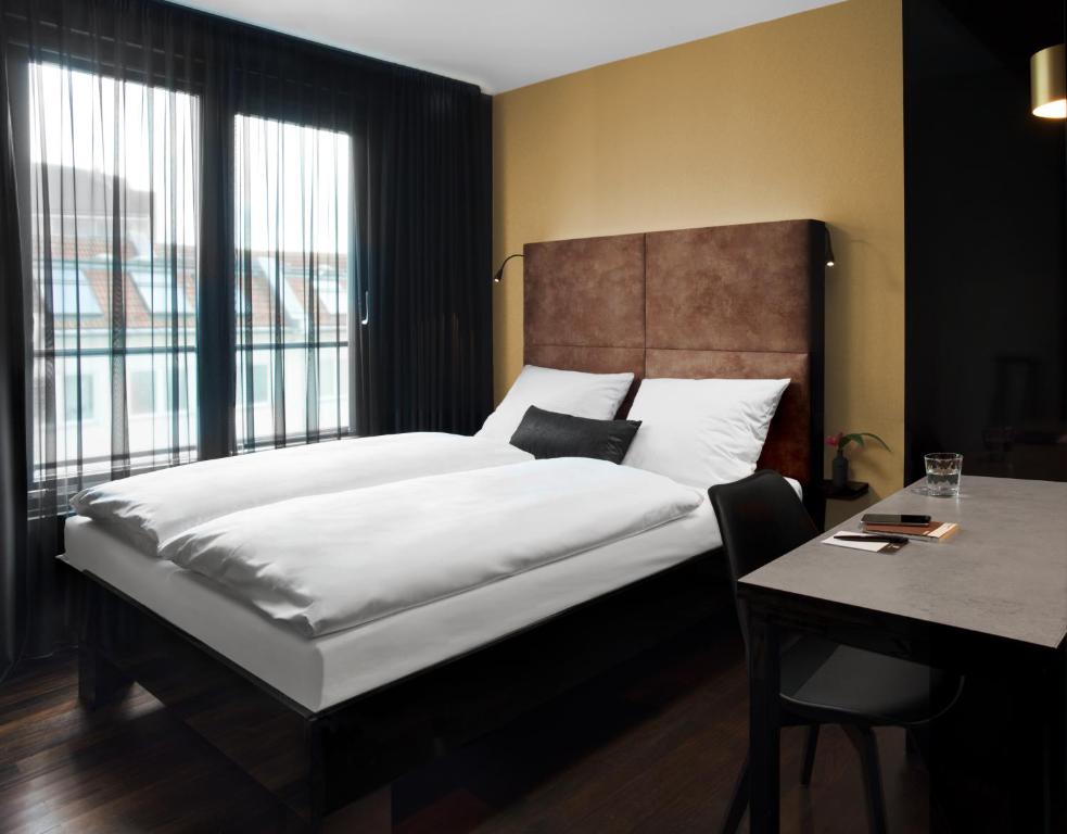 Postel nebo postele na pokoji v ubytování Hotel ZOE by AMANO