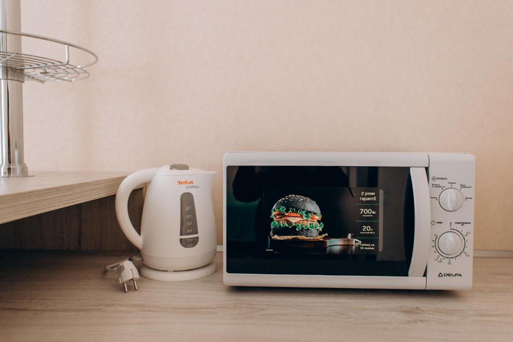 Příslušenství pro přípravu čaje a kávy v ubytování Hotel DA NONNA