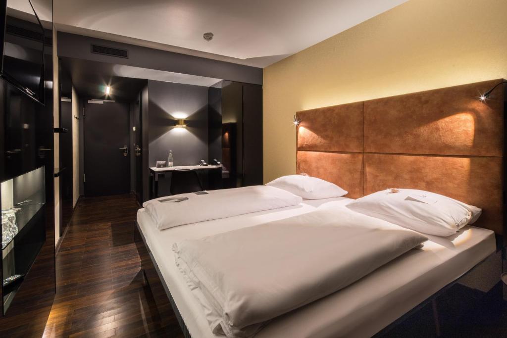Postel nebo postele na pokoji v ubytování Hotel ZOE by AMANO