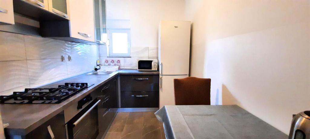 Kuchyňa alebo kuchynka v ubytovaní Apartment Miroslav