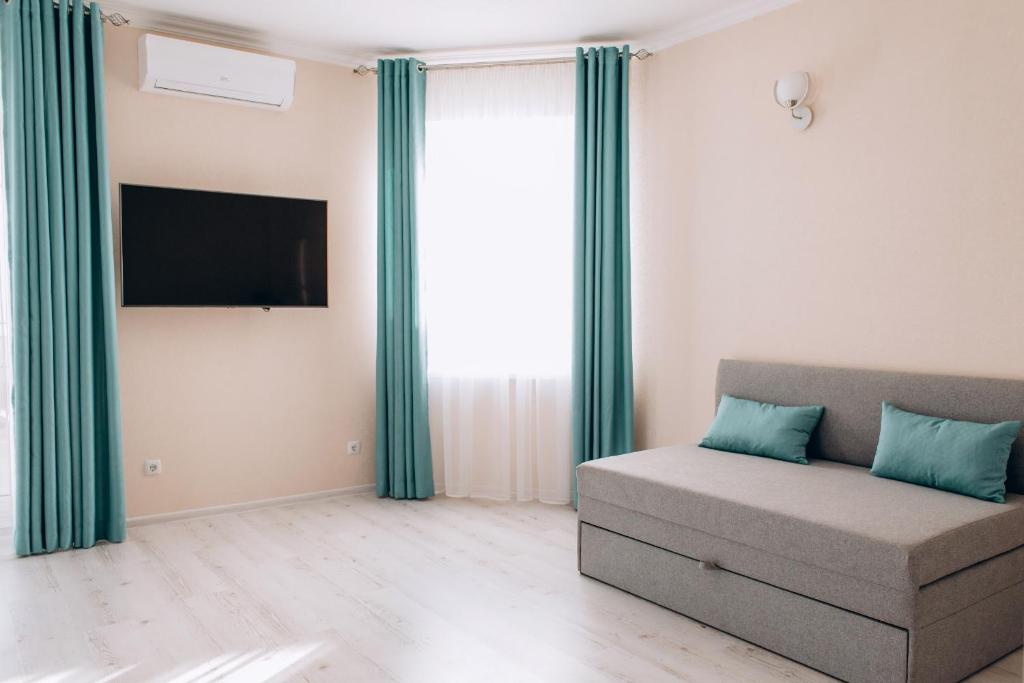 TV a/nebo společenská místnost v ubytování Hotel DA NONNA