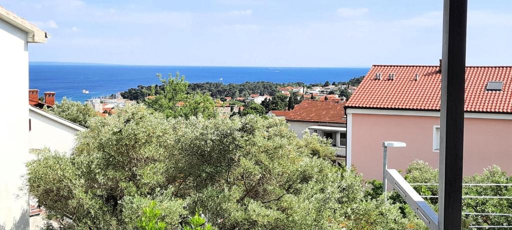 a view of the ocean from a house at Apartment Miroslav in Krk