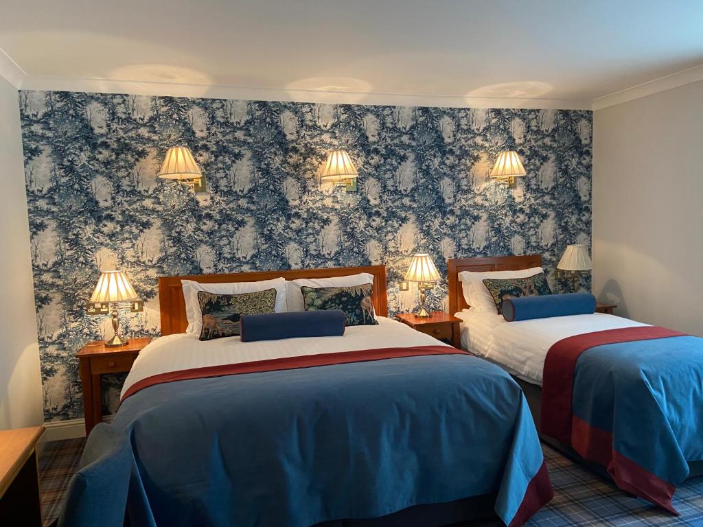 Voodi või voodid majutusasutuse Blarney Castle Hotel toas