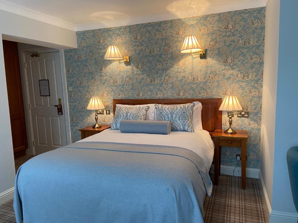 Voodi või voodid majutusasutuse Blarney Castle Hotel toas