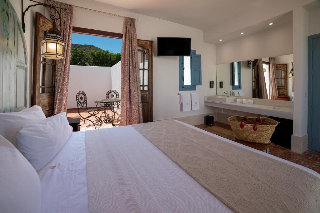 A bed or beds in a room at Finca Maltes San José