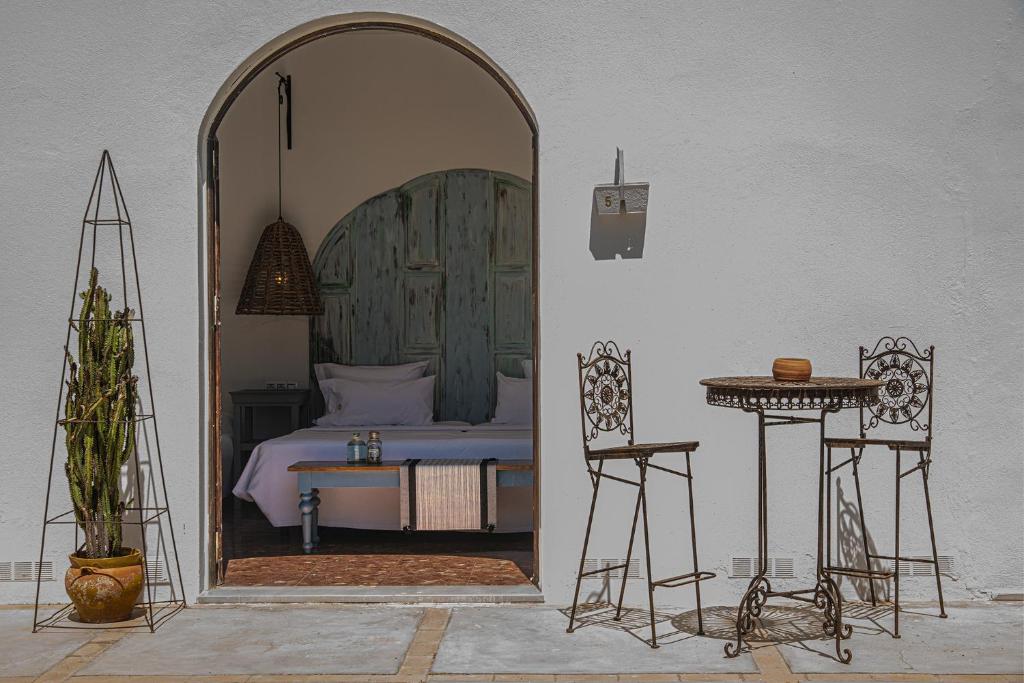 A bed or beds in a room at Finca Maltes San José