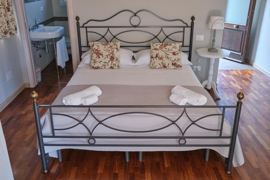 Postel nebo postele na pokoji v ubytování Tenuta EDONE' Country House