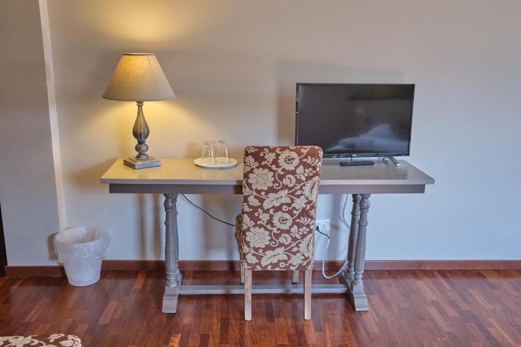 TV a/nebo společenská místnost v ubytování Tenuta EDONE' Country House