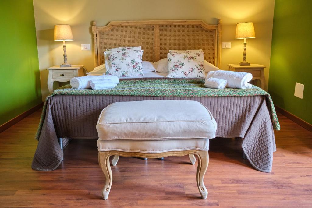 Postel nebo postele na pokoji v ubytování Tenuta EDONE' Country House