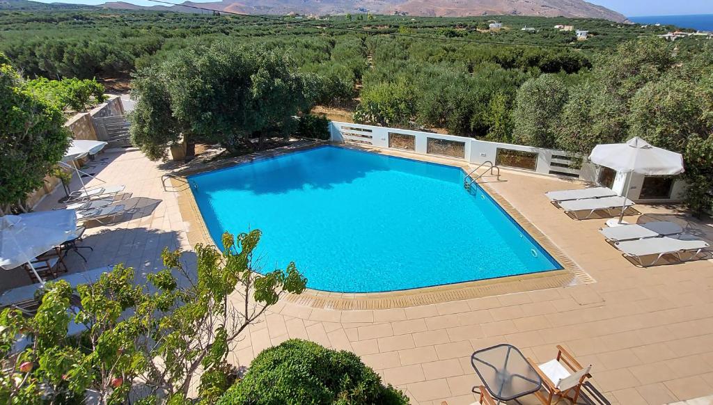 Bazén v ubytovaní Villa "Thealia", 430 m2 with swimmg pool - sea view alebo v jeho blízkosti