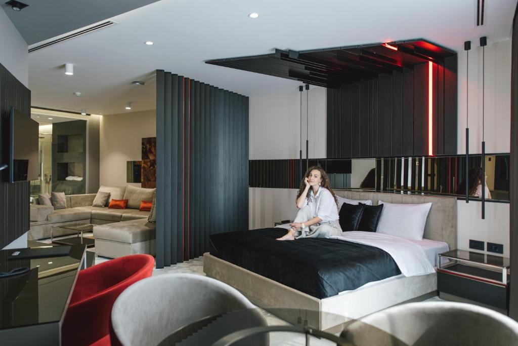 Postel nebo postele na pokoji v ubytování Hotel Ženeva Lux