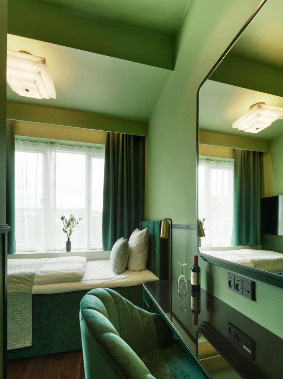 Postel nebo postele na pokoji v ubytování WIDE Hotel