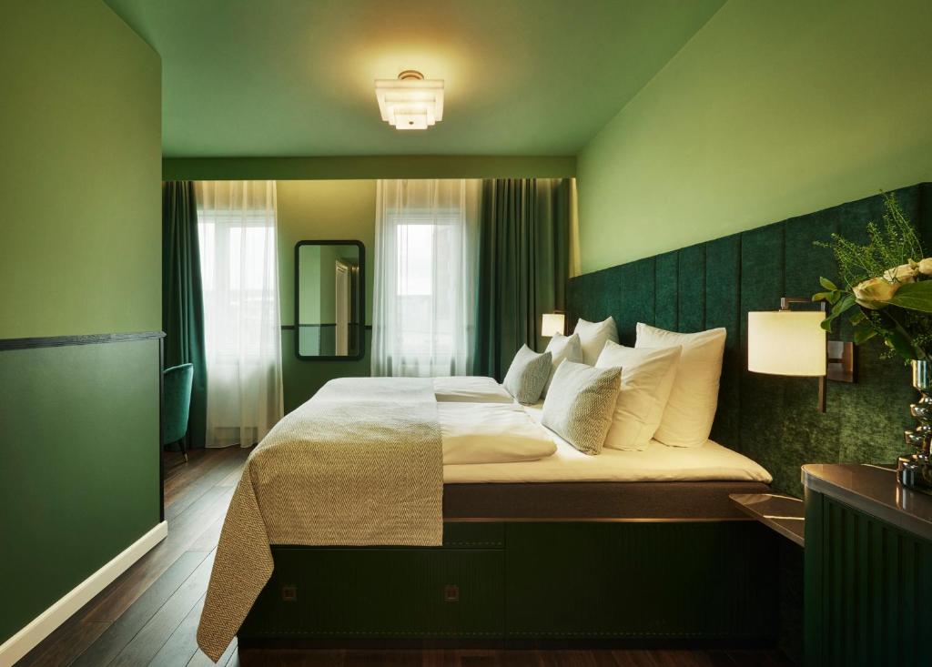 Postel nebo postele na pokoji v ubytování WIDE Hotel