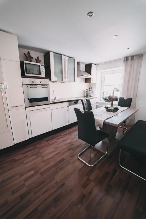 Kuchyň nebo kuchyňský kout v ubytování Haus NIEDERREITER