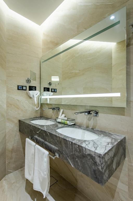 Koupelna v ubytování Hotel Ženeva Lux