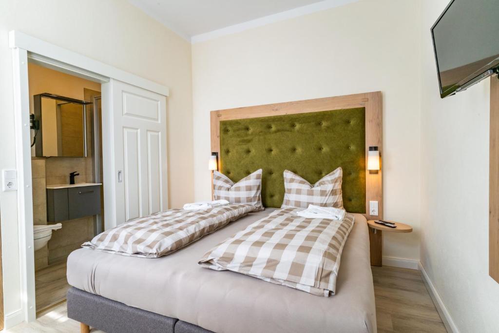 Postel nebo postele na pokoji v ubytování Haus Emma