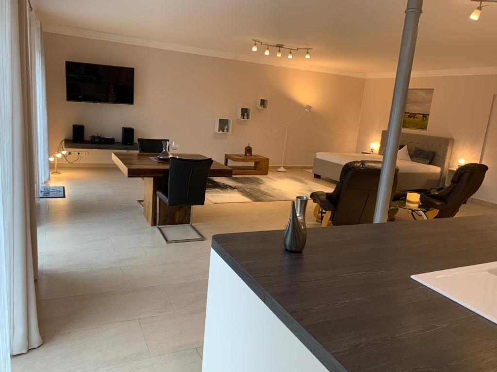 TV a/nebo společenská místnost v ubytování Gästezimmer & Appartement Elskop