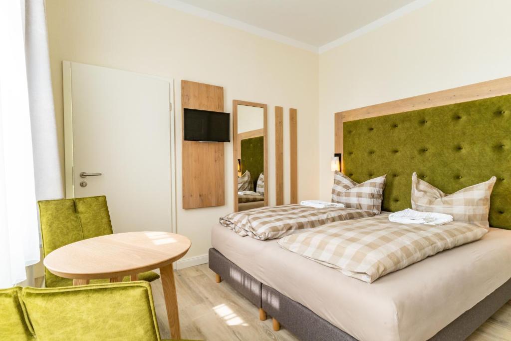 Postel nebo postele na pokoji v ubytování Haus Emma