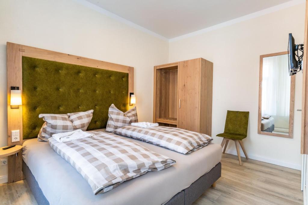 Postel nebo postele na pokoji v ubytování Haus Emma