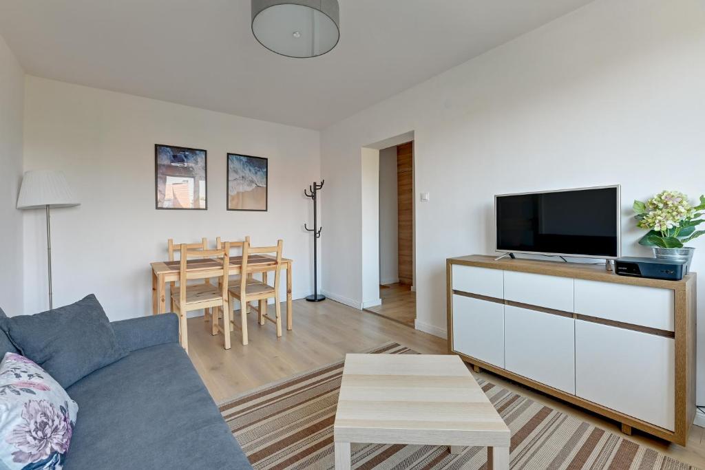 Televízia a/alebo spoločenská miestnosť v ubytovaní Lion Apartments - Korfu