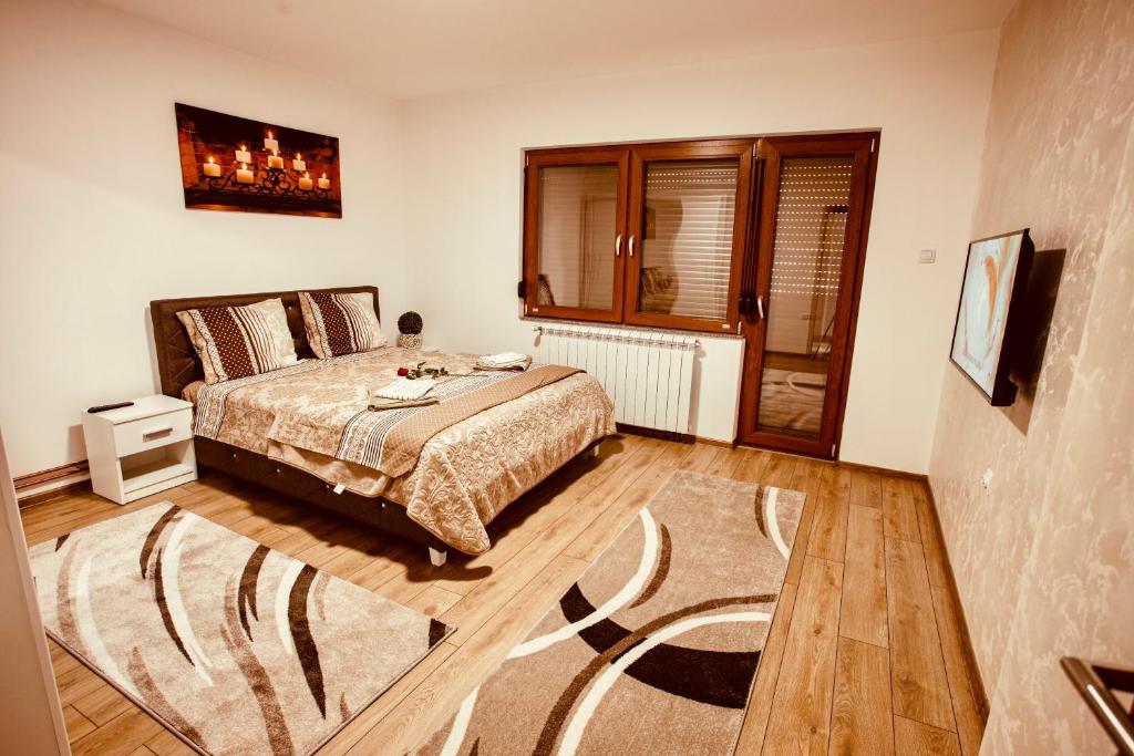 Postel nebo postele na pokoji v ubytování Apartmani IN Zlatar