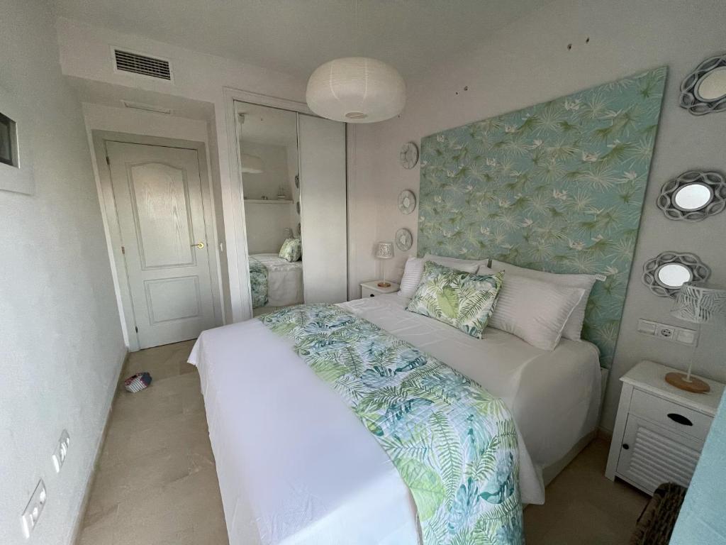 Posteľ alebo postele v izbe v ubytovaní Penthouse beach apartment