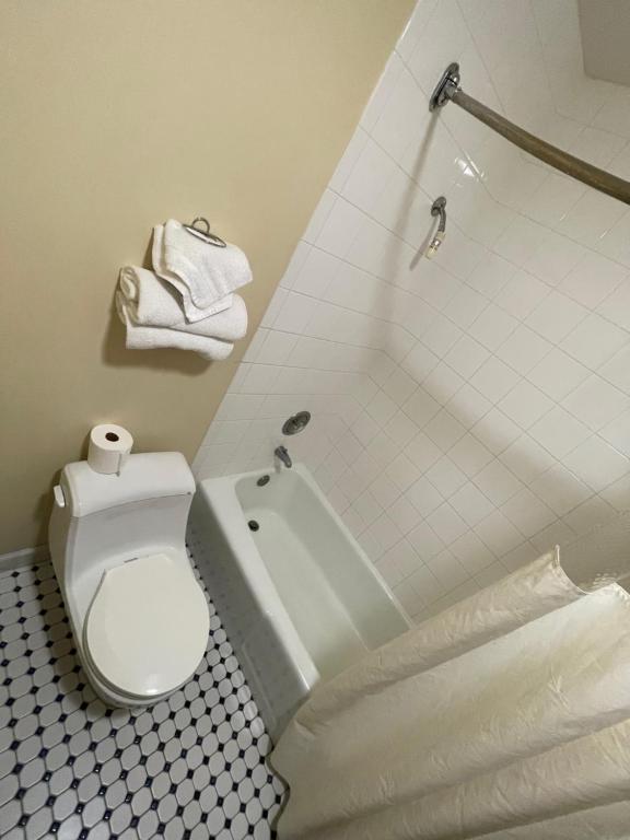 VIBE INN - WHIRLPOOLS SUITES - Lyons - Habitación De La Reina
