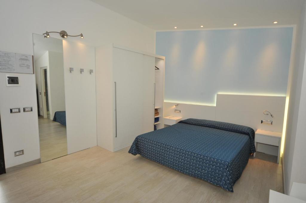 Postel nebo postele na pokoji v ubytování Casa Campanella Resort