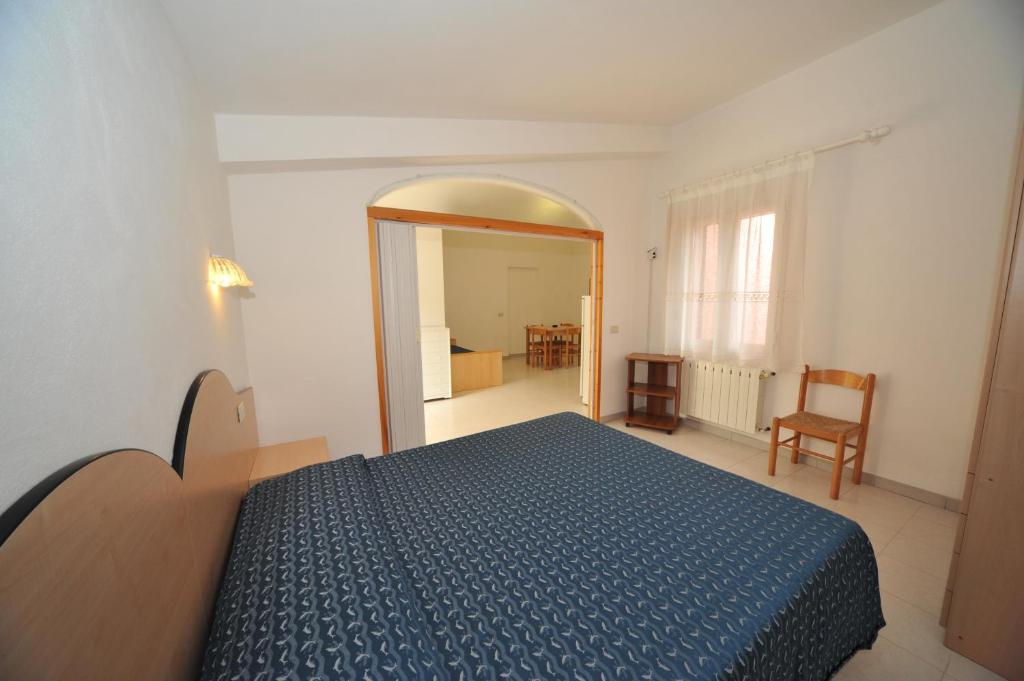 Postel nebo postele na pokoji v ubytování Casa Campanella Resort