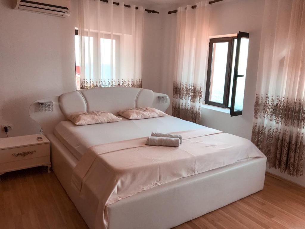 Postel nebo postele na pokoji v ubytování Guest house Naser
