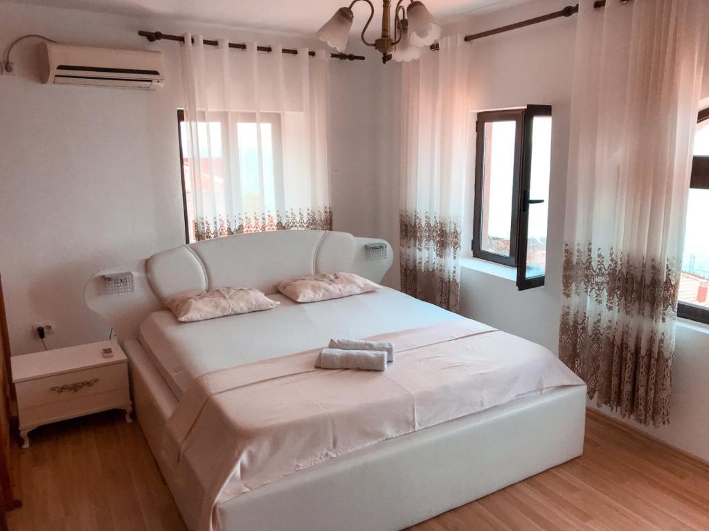 Postel nebo postele na pokoji v ubytování Guest house Naser
