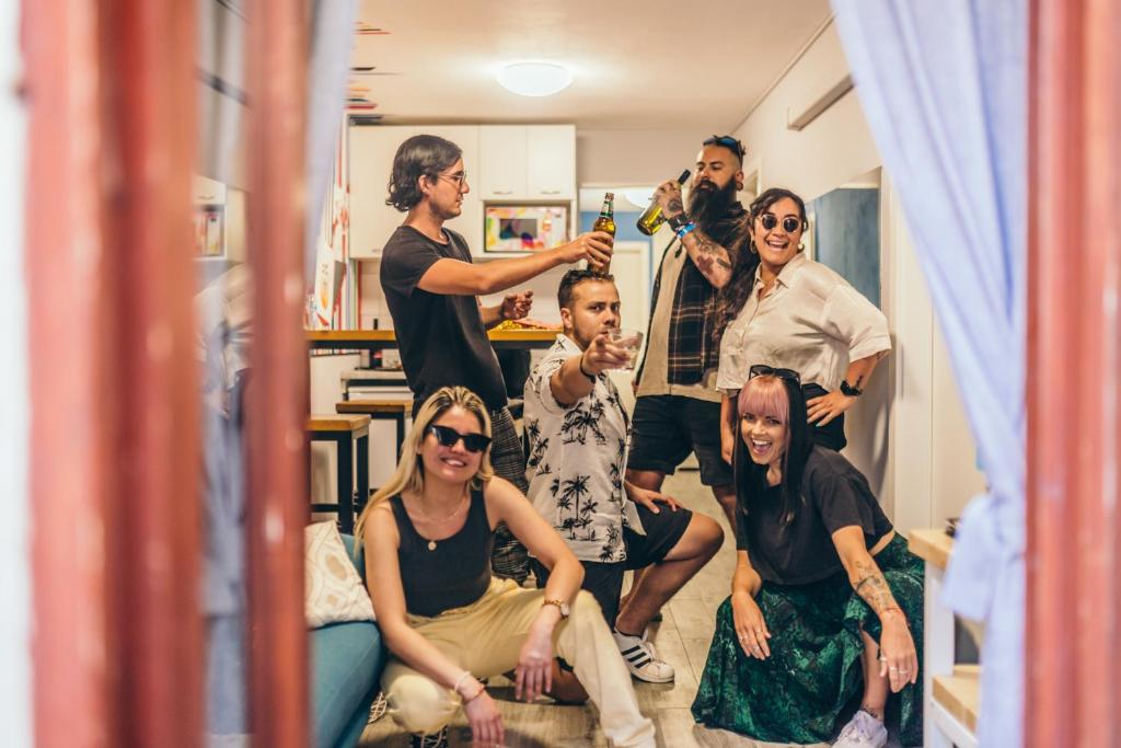 a group of people standing in front of a mirror at Fiesta Siesta Social Hostel in Split