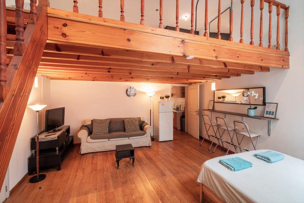 Ένα ή περισσότερα κρεβάτια σε δωμάτιο στο Saint Paulus Square Apartments