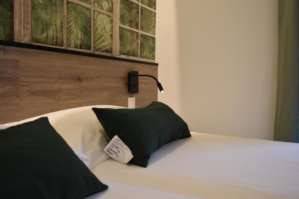 Postel nebo postele na pokoji v ubytování Casp Green House