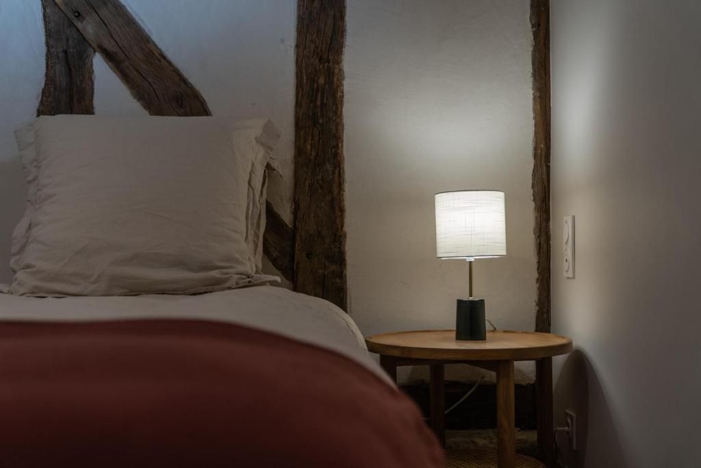 Postel nebo postele na pokoji v ubytování La Grange De Léonie, Chambres d'hôtes avec Piscine et Spa