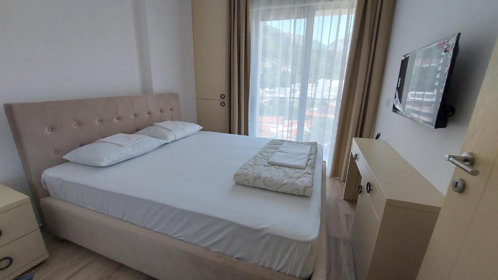 Krevet ili kreveti u jedinici u okviru objekta Hotel Kaligrosh