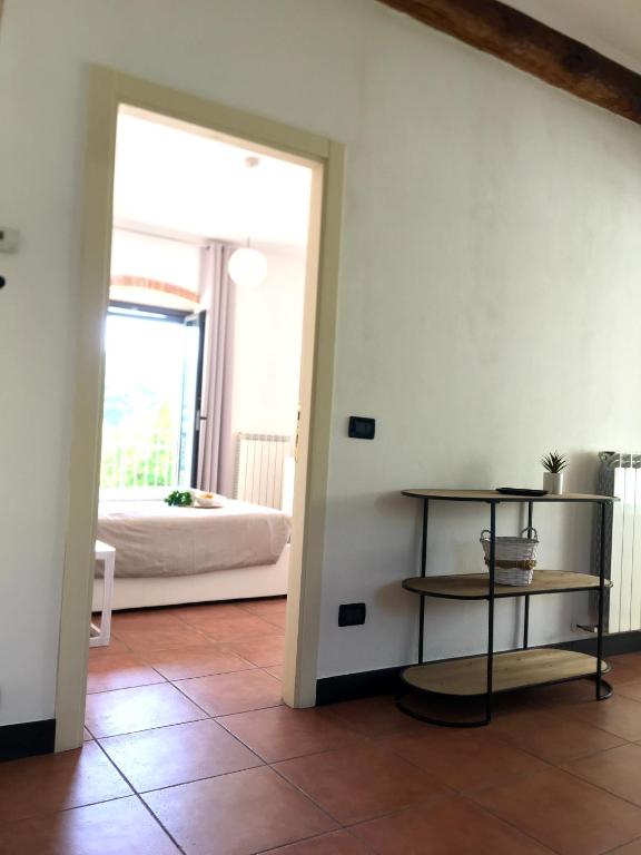 Posteľ alebo postele v izbe v ubytovaní La casa di Giulia Apartment with air conditioning, wifi and private parking