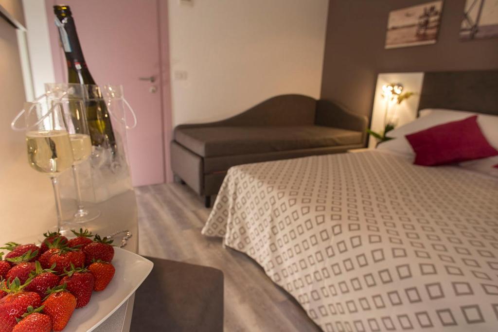 Postel nebo postele na pokoji v ubytování Hotel Marcus