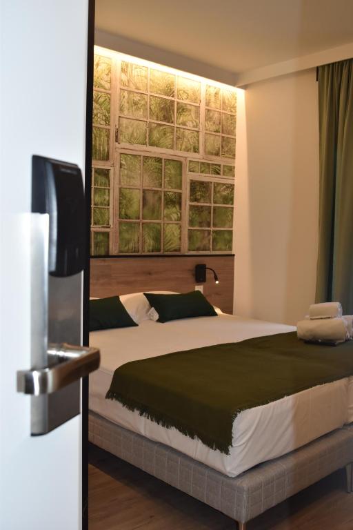Postel nebo postele na pokoji v ubytování Casp Green House