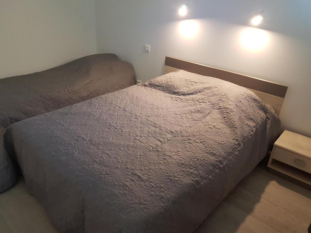 Postel nebo postele na pokoji v ubytování LA FRANQUI proche plage - vue mer - wifi - clim
