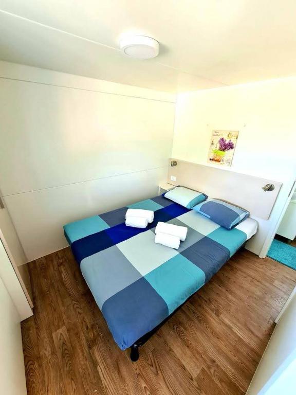 Postel nebo postele na pokoji v ubytování 2Pines House