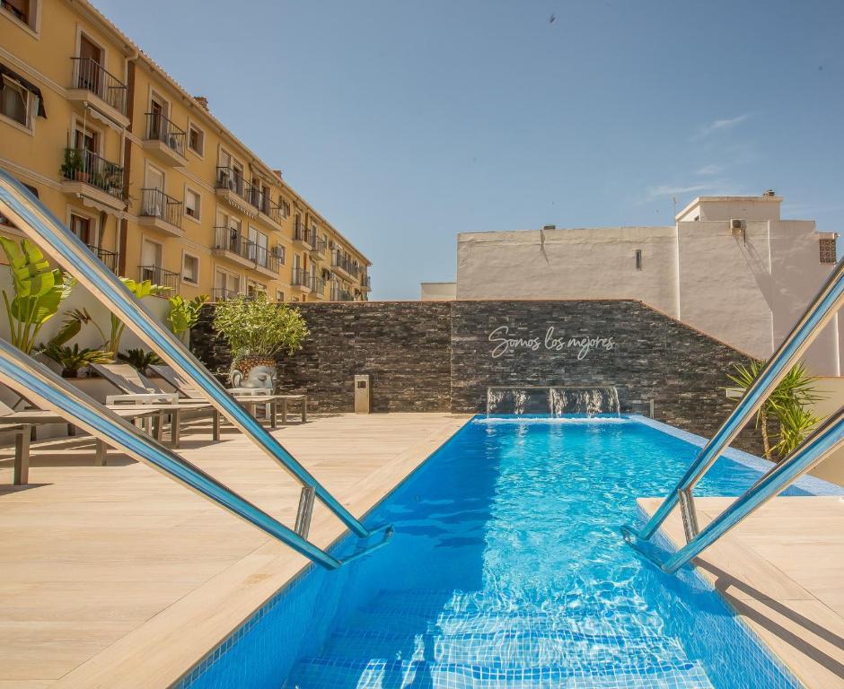 a swimming pool in the middle of a building at Hotel Brö-Adults Recommended in Málaga