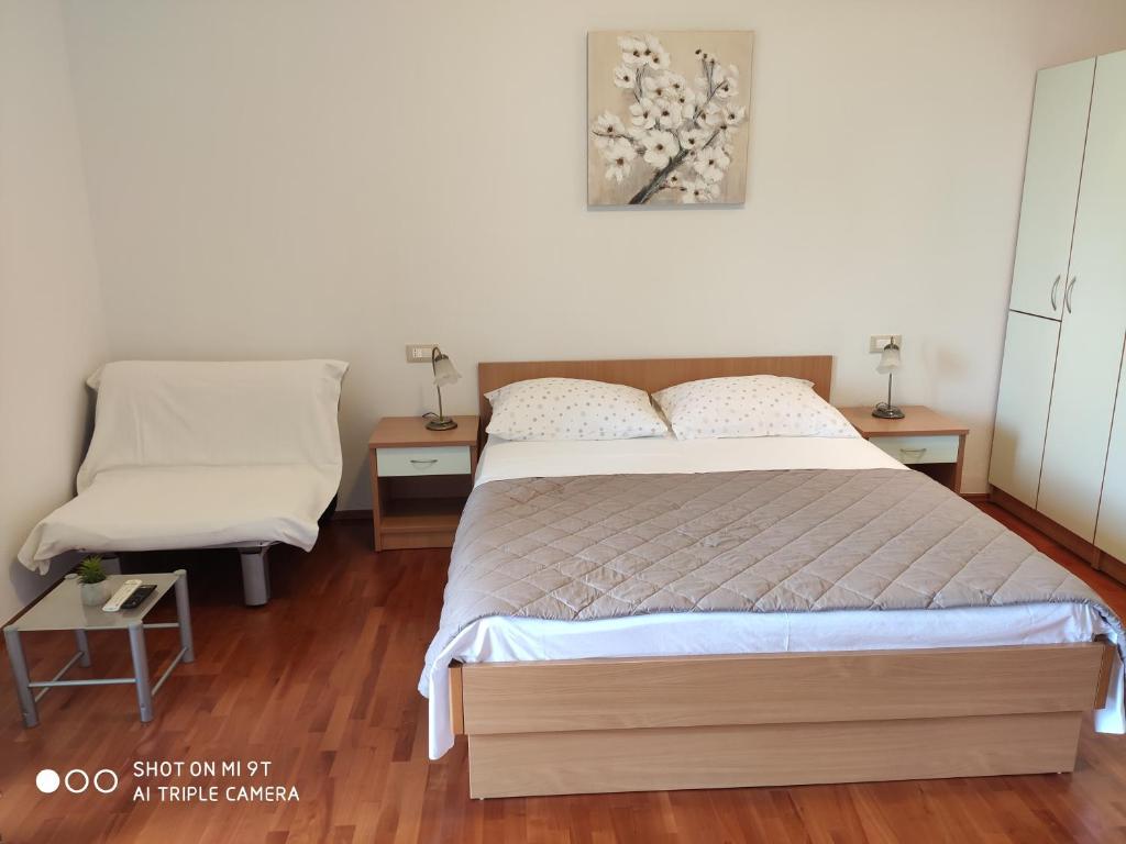 Postel nebo postele na pokoji v ubytování Apartment Valentina