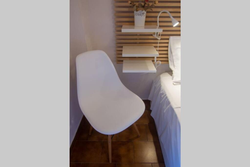 Postel nebo postele na pokoji v ubytování Natsios Thanasakis Apartment