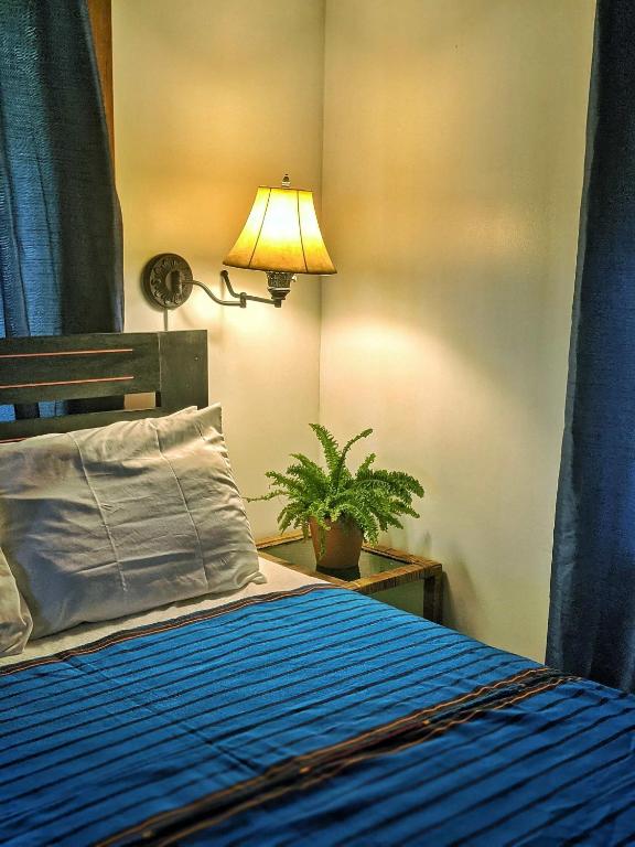 Postel nebo postele na pokoji v ubytování Seaside Inn Roatan